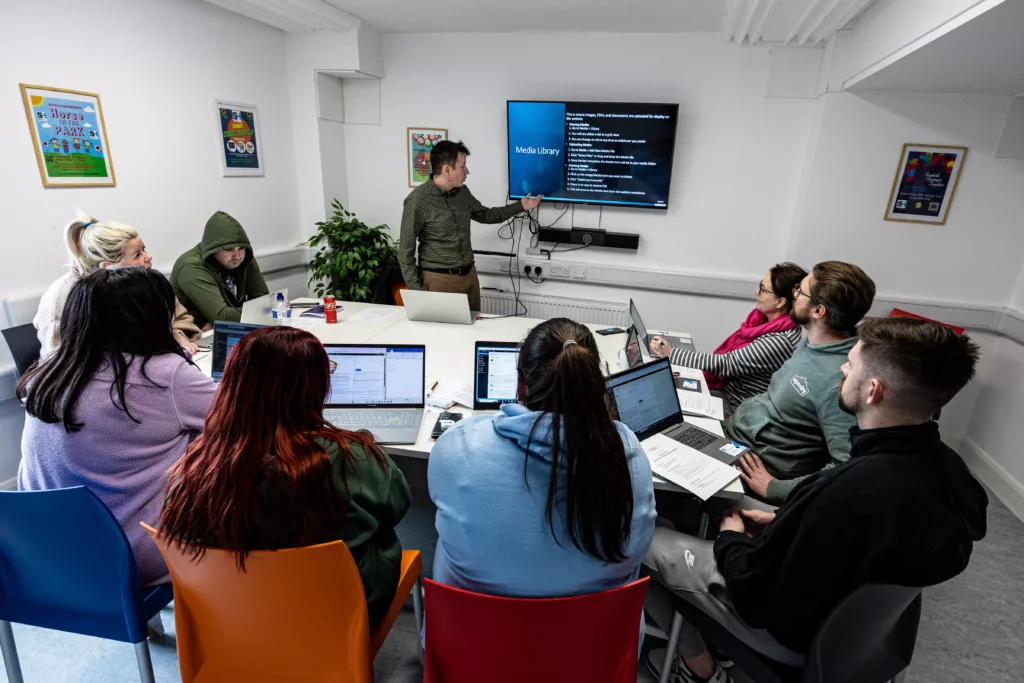 07-02-2024 WebDevBuilders, CEO Chris Heaney giving hands on WordPress tutorial instruction to Southill Hub to enable them to update their Web Site in house. Picture : Keith Wiseman/WebDevBuilders